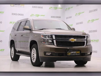 Chevrolet  Tahoe  LS  2016  Automatic  122,000 Km  8 Cylinder  Rear Wheel Drive (RWD)  SUV  Brown