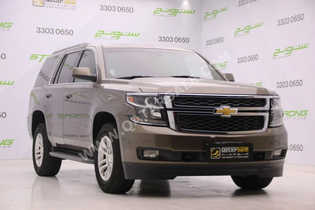 Chevrolet  Tahoe  LS  2016  Automatic  122,000 Km  8 Cylinder  Rear Wheel Drive (RWD)  SUV  Brown