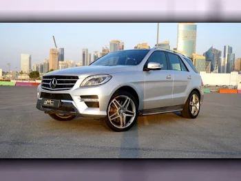 مرسيدس - بنز  ام ال  400 AMG  2015  اوتوماتيك  166,000 كم  6 سلندر  دفع رباعي  اس يو في  فضي