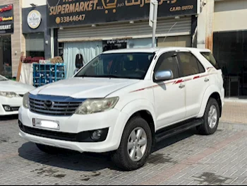 Toyota  Fortuner  SR5  2011  Automatic  353,000 Km  4 Cylinder  Four Wheel Drive (4WD)  SUV  White