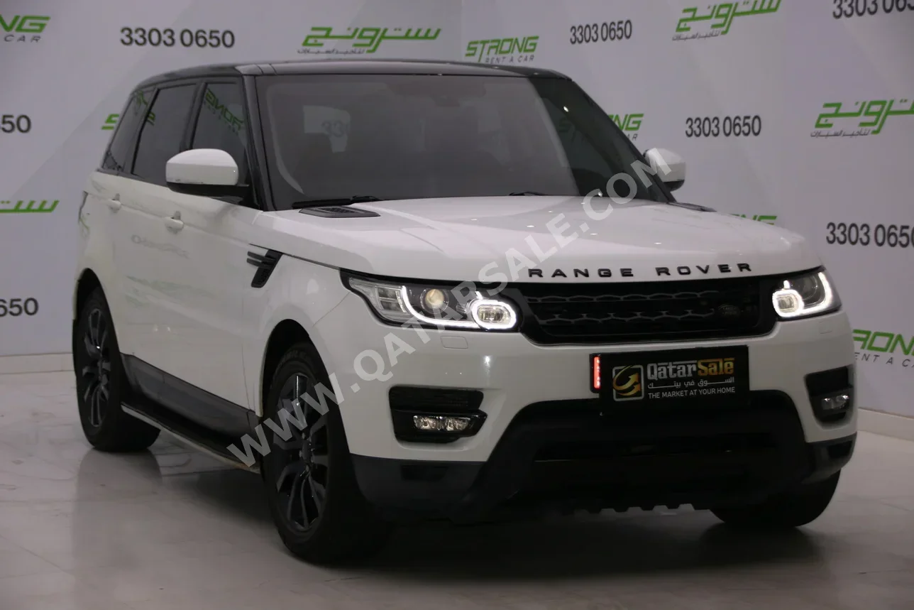 Land Rover  Range Rover  Sport  2014  Automatic  135,000 Km  6 Cylinder  Four Wheel Drive (4WD)  SUV  White