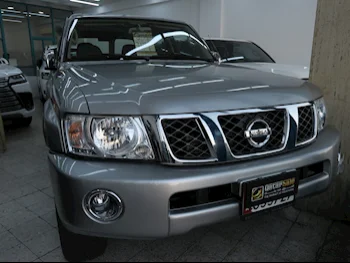 Nissan  Patrol  Safari  2023  Automatic  13,000 Km  6 Cylinder  Four Wheel Drive (4WD)  SUV  Silver  With Warranty