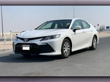 Toyota  Camry  LE  2021  Automatic  31,000 Km  4 Cylinder  Front Wheel Drive (FWD)  Sedan  White