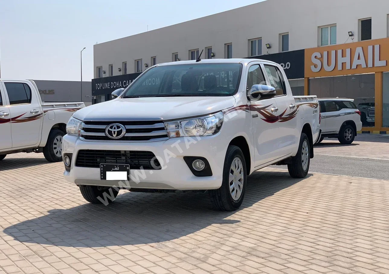 Toyota  Hilux  2022  Automatic  77,000 Km  4 Cylinder  Rear Wheel Drive (RWD)  Pick Up  White