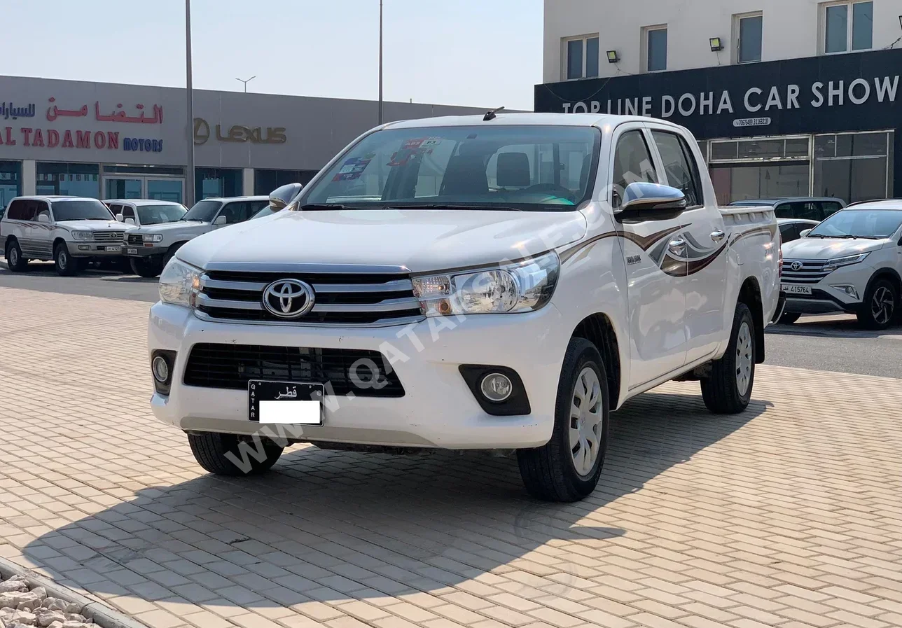 Toyota  Hilux  2019  Automatic  76,000 Km  4 Cylinder  Four Wheel Drive (4WD)  Pick Up  White