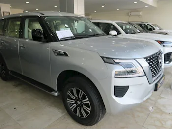  Nissan  Patrol  XE  2024  Automatic  0 Km  6 Cylinder  Four Wheel Drive (4WD)  SUV  Silver  With Warranty