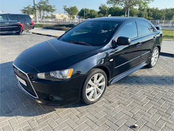 Mitsubishi  Lancer  GT  2014  Automatic  150,000 Km  4 Cylinder  Front Wheel Drive (FWD)  Sedan  Black