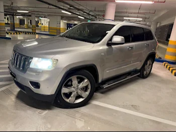 Jeep  Grand Cherokee  Limited  2012  Automatic  297,000 Km  8 Cylinder  Four Wheel Drive (4WD)  SUV  Silver