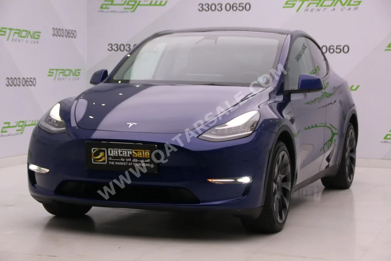 Tesla  Model Y  2022  Automatic  70,000 Km  0 Cylinder  Four Wheel Drive (4WD)  Sedan  Dark Blue