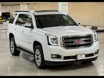 GMC  Yukon  SLT  2019  Automatic  96,000 Km  8 Cylinder  Four Wheel Drive (4WD)  SUV  White