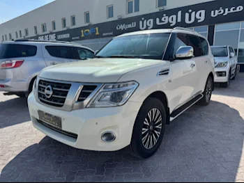 Nissan  Patrol  Platinum  2013  Automatic  427,000 Km  8 Cylinder  Four Wheel Drive (4WD)  SUV  White