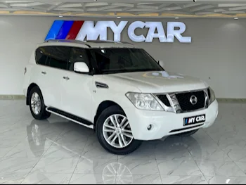 Nissan  Patrol  LE  2012  Automatic  209,000 Km  8 Cylinder  Four Wheel Drive (4WD)  SUV  White