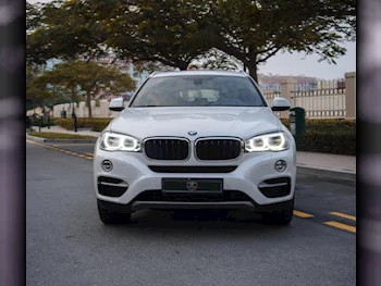 BMW  X-Series  X6  2018  Automatic  90,000 Km  6 Cylinder  Four Wheel Drive (4WD)  SUV  White