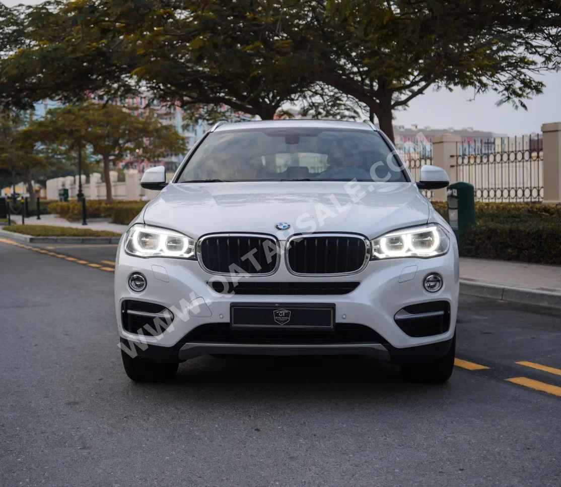 BMW  X-Series  X6  2018  Automatic  90,000 Km  6 Cylinder  Four Wheel Drive (4WD)  SUV  White