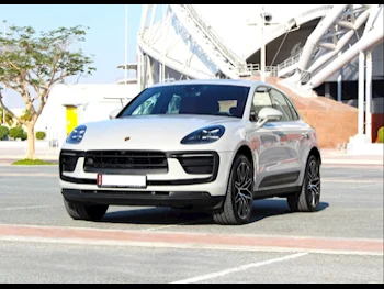 Porsche  Macan  4 Cylinder  SUV ( AWD )  Grey  2024