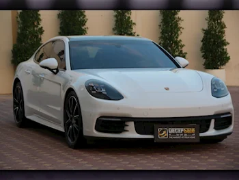 Porsche  Panamera  2019  Automatic  100,000 Km  6 Cylinder  Rear Wheel Drive (RWD)  Sedan  White