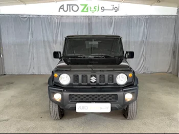 Suzuki  Jimny  2023  Automatic  76,300 Km  4 Cylinder  Four Wheel Drive (4WD)  SUV  Black  With Warranty