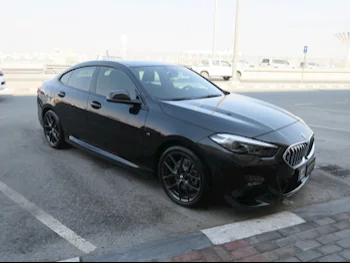 BMW  2-Series  218i  2021  Automatic  38,000 Km  4 Cylinder  Front Wheel Drive (FWD)  Sedan  Black  With Warranty