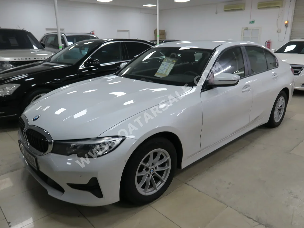 BMW  3-Series  320i  2021  Automatic  66,000 Km  4 Cylinder  Rear Wheel Drive (RWD)  Sedan  White