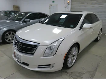 Cadillac  XTS  4  2014  Automatic  157,000 Km  6 Cylinder  Rear Wheel Drive (RWD)  Sedan  White