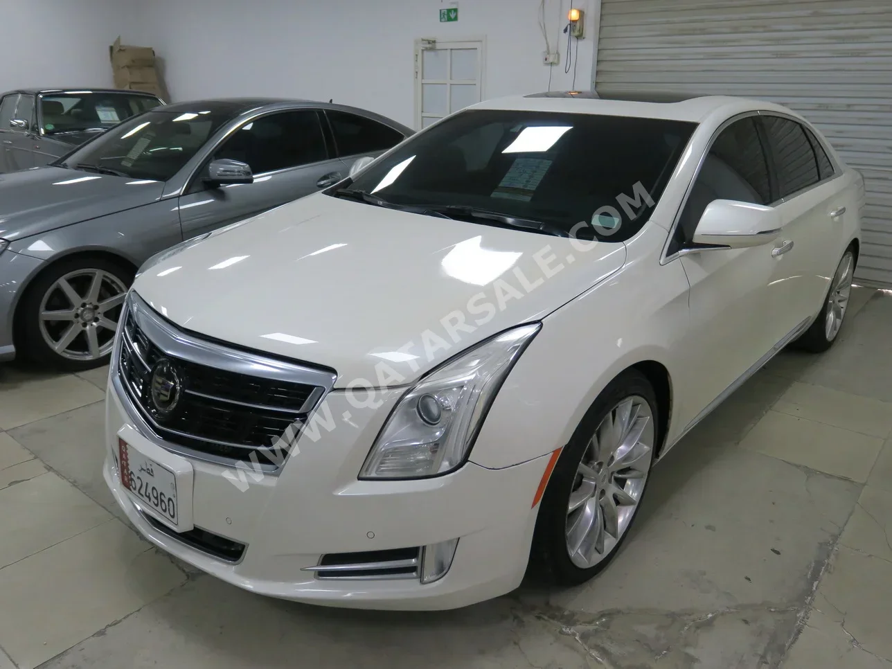 Cadillac  XTS  4  2014  Automatic  157,000 Km  6 Cylinder  Rear Wheel Drive (RWD)  Sedan  White