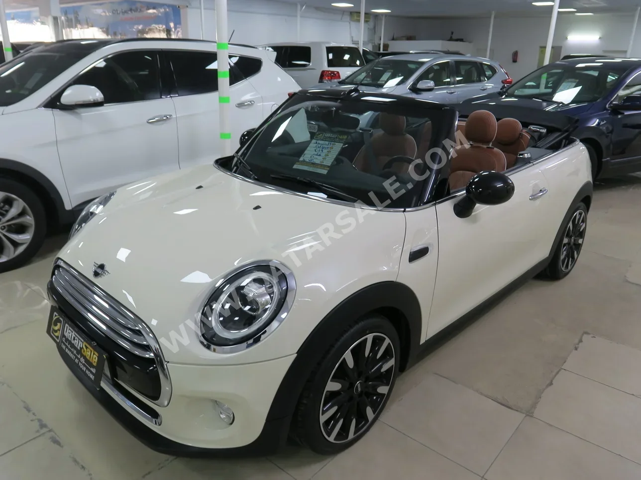 Mini  Cooper  2019  Automatic  21,000 Km  4 Cylinder  Front Wheel Drive (FWD)  Hatchback  Beige