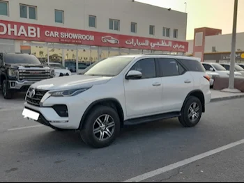 Toyota  Fortuner  2023  Automatic  13,000 Km  4 Cylinder  Four Wheel Drive (4WD)  SUV  White  With Warranty