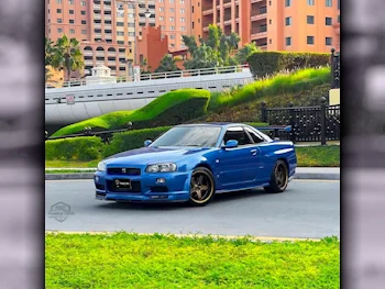 Nissan  Skyline  R34 GT-R  2000  Manual  9,000 Km  6 Cylinder  Rear Wheel Drive (RWD)  Coupe / Sport  Blue