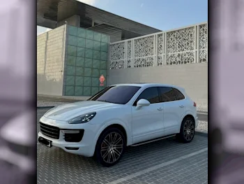 Porsche  Cayenne  Turbo  2015  Automatic  97,000 Km  8 Cylinder  Four Wheel Drive (4WD)  SUV  White  With Warranty