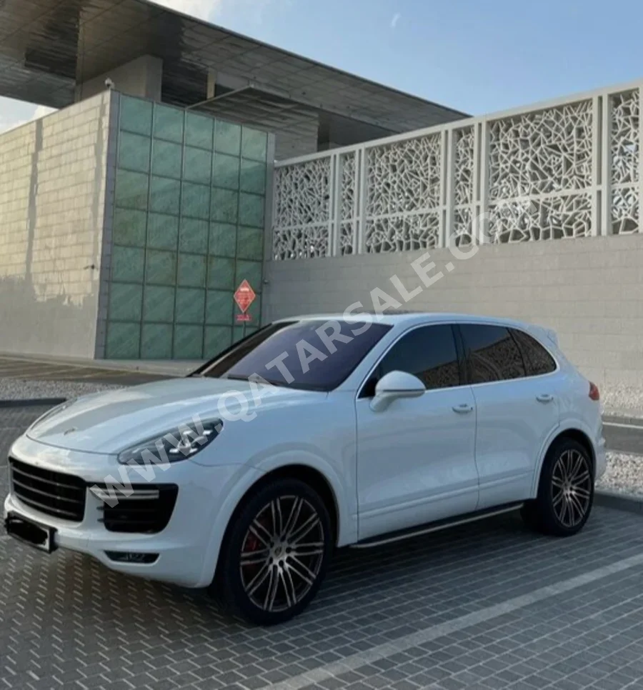 Porsche  Cayenne  Turbo  2015  Automatic  97,000 Km  8 Cylinder  Four Wheel Drive (4WD)  SUV  White  With Warranty