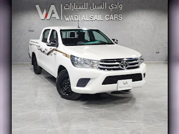 Toyota  Hilux  2024  Manual  20,000 Km  4 Cylinder  Front Wheel Drive (FWD)  Pick Up  White  With Warranty