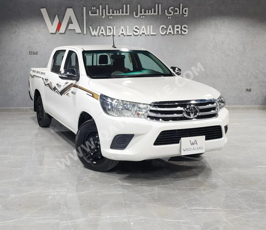 Toyota  Hilux  2024  Manual  20,000 Km  4 Cylinder  Front Wheel Drive (FWD)  Pick Up  White  With Warranty