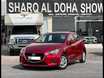 Mazda  Mazda 2  2016  Automatic  124,000 Km  4 Cylinder  Rear Wheel Drive (RWD)  Sedan  Red