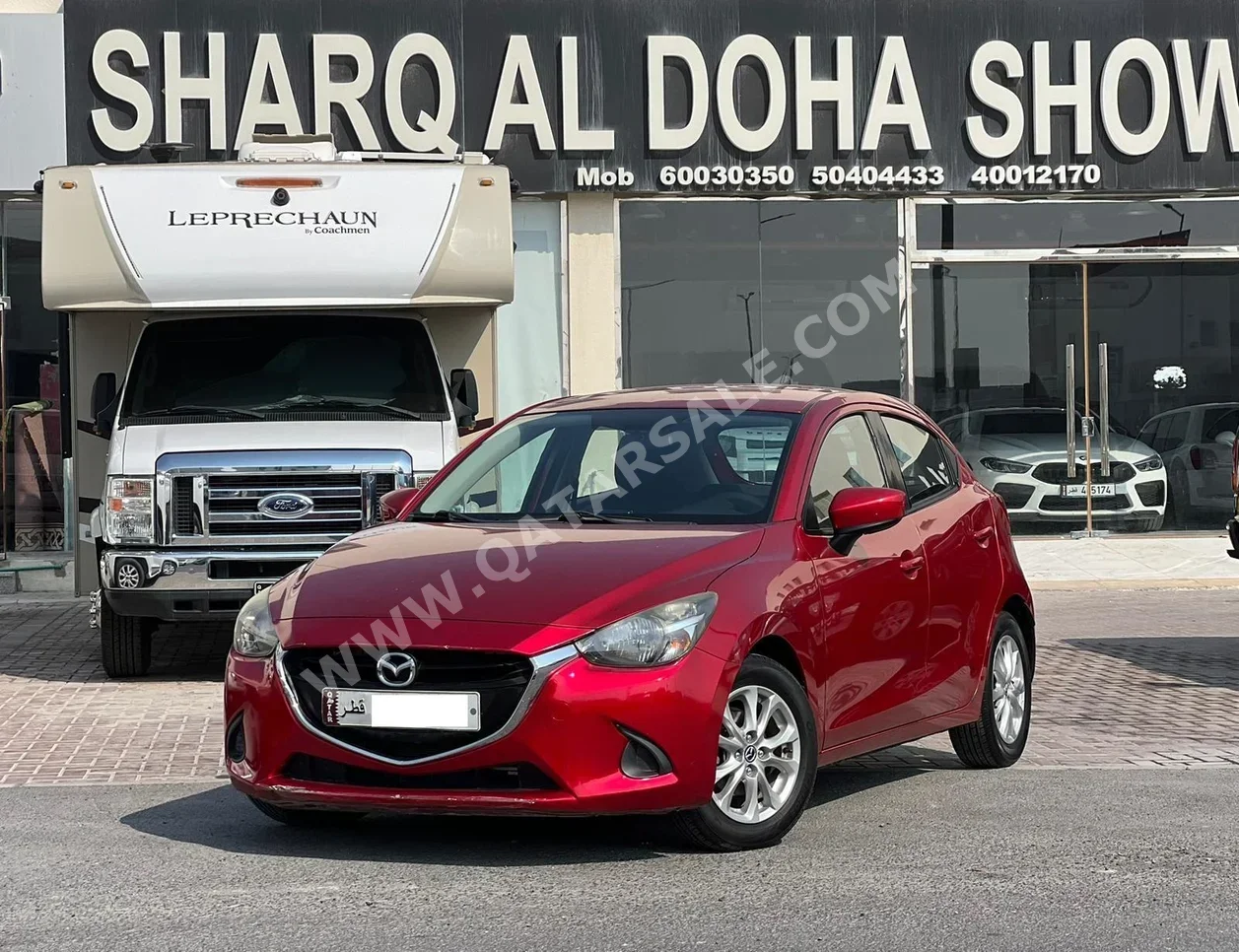 Mazda  Mazda 2  2016  Automatic  124,000 Km  4 Cylinder  Rear Wheel Drive (RWD)  Sedan  Red