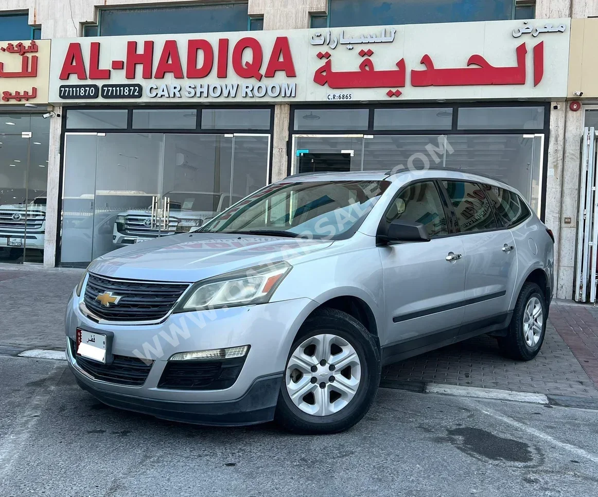 Chevrolet  Traverse  LS  2015  Automatic  107,000 Km  6 Cylinder  Four Wheel Drive (4WD)  SUV  Silver