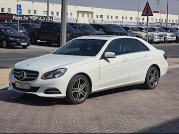 Mercedes-Benz  E-Class  200  2016  Automatic  76,000 Km  4 Cylinder  Rear Wheel Drive (RWD)  Sedan  White