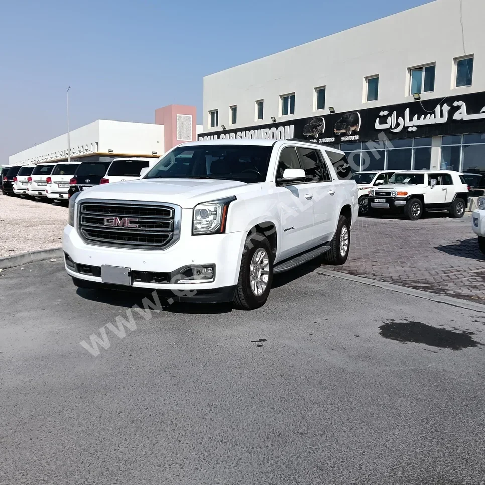 GMC  Yukon  XL  2015  Automatic  223,000 Km  8 Cylinder  Four Wheel Drive (4WD)  SUV  White