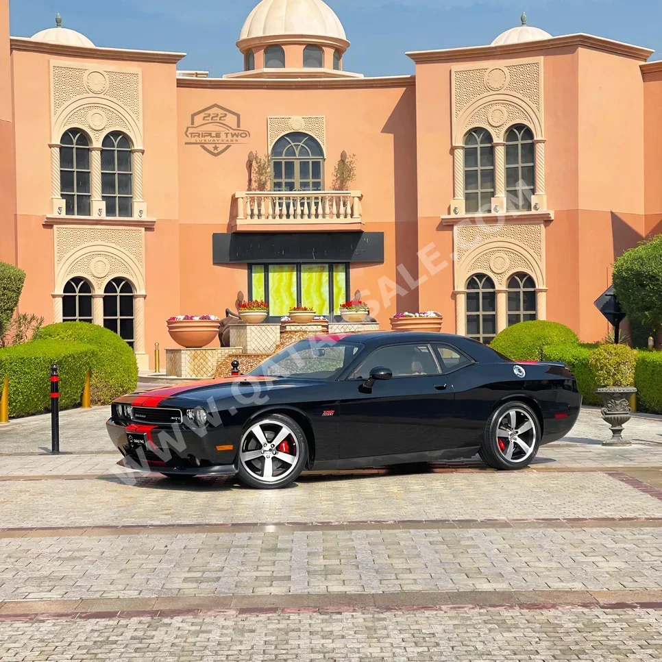 Dodge  Challenger  SRT  2012  Automatic  4,850 Km  8 Cylinder  Rear Wheel Drive (RWD)  Coupe / Sport  Black