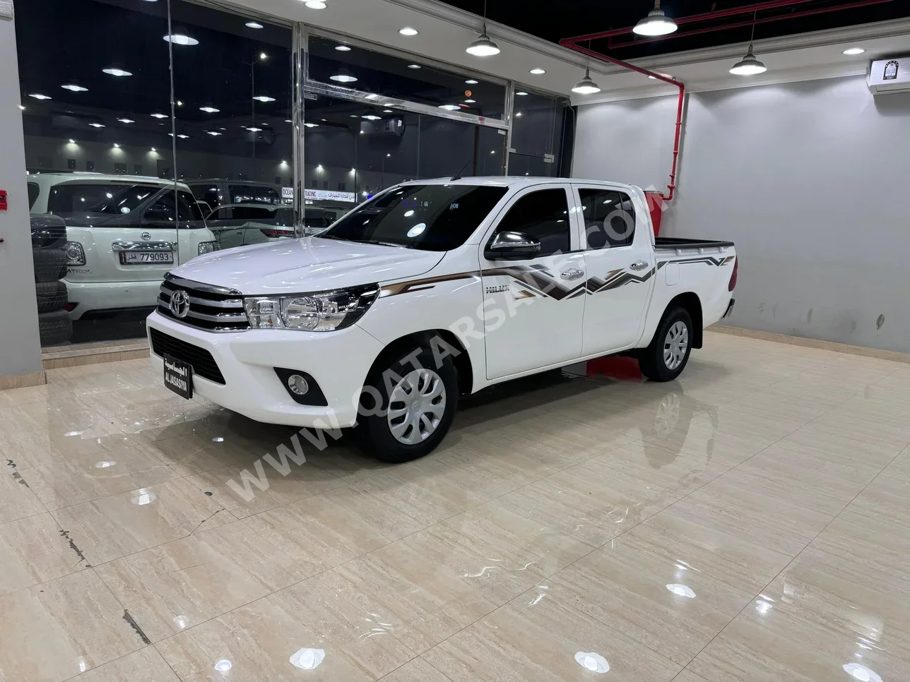 Toyota  Hilux  2024  Automatic  5,000 Km  4 Cylinder  Four Wheel Drive (4WD)  Pick Up  White  With Warranty