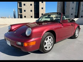 Porsche  911  Carrera 4  1990  Manual  68,000 Km  6 Cylinder  Rear Wheel Drive (RWD)  Convertible  Maroon