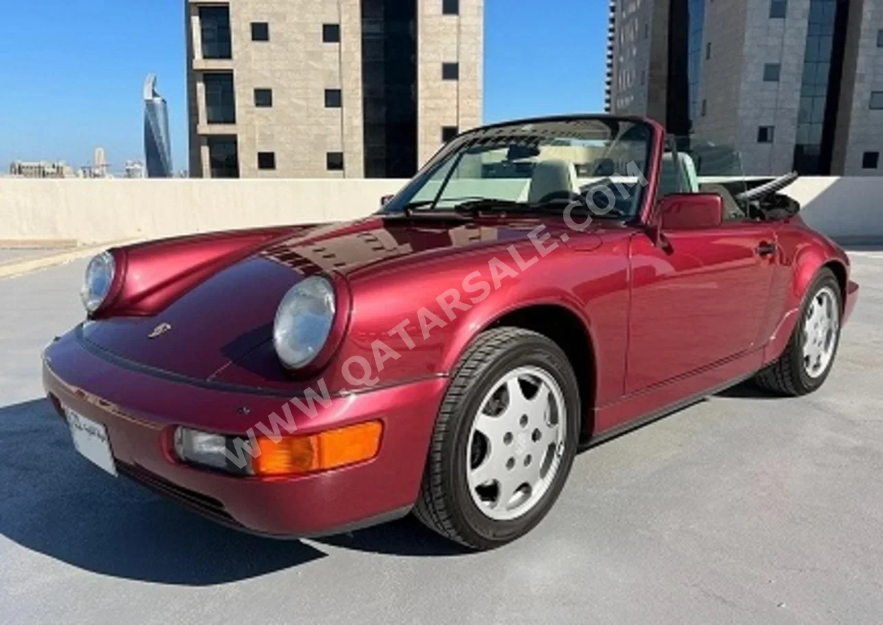 Porsche  911  Carrera 4  1990  Manual  68,000 Km  6 Cylinder  Rear Wheel Drive (RWD)  Convertible  Maroon