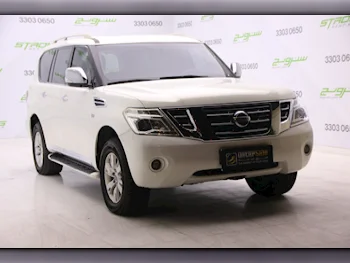 Nissan  Patrol  SE  2012  Automatic  209,000 Km  8 Cylinder  Four Wheel Drive (4WD)  SUV  Pearl