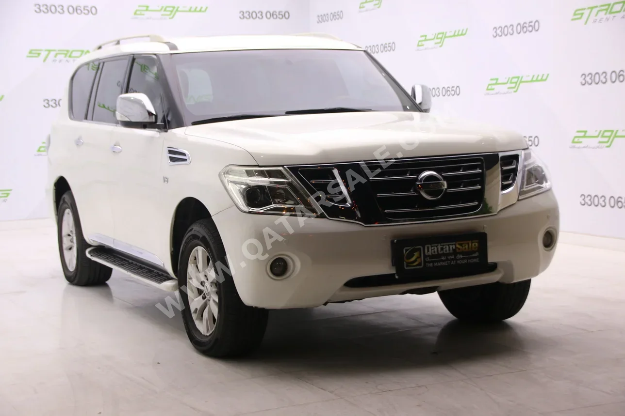 Nissan  Patrol  SE  2012  Automatic  209,000 Km  8 Cylinder  Four Wheel Drive (4WD)  SUV  Pearl