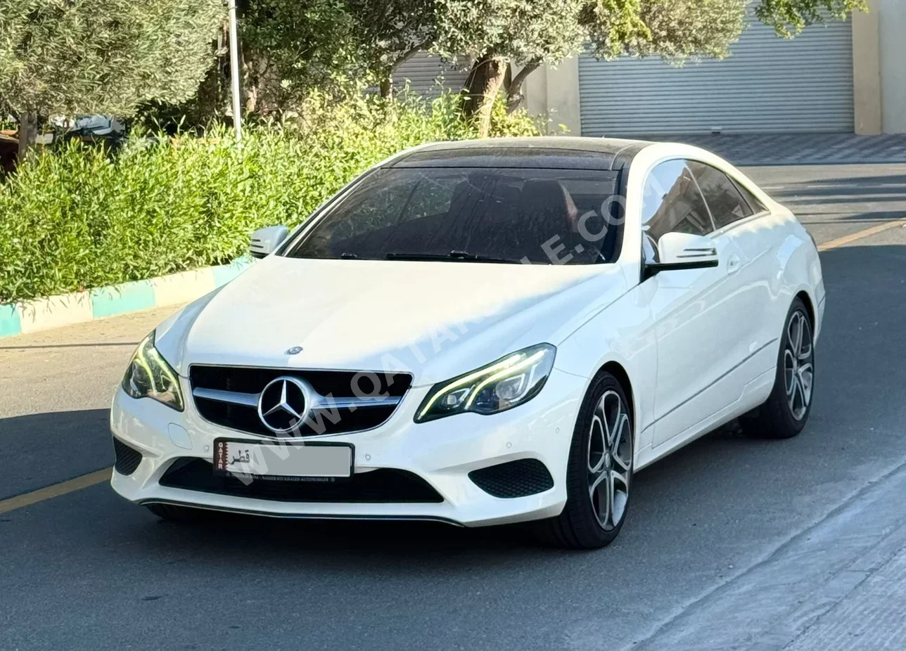 Mercedes-Benz  E-Class  200 AMG  2015  Automatic  118,000 Km  4 Cylinder  Rear Wheel Drive (RWD)  Sedan  White