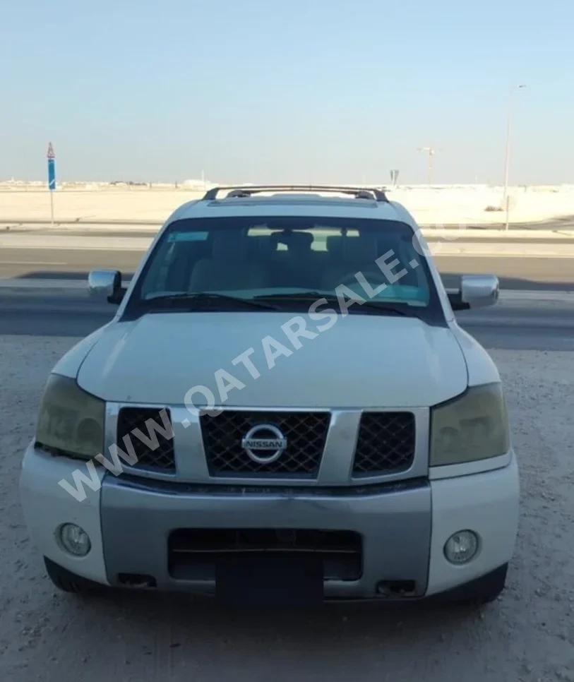 Nissan  Armada  SE  2005  Automatic  33,589 Km  8 Cylinder  Four Wheel Drive (4WD)  SUV  White