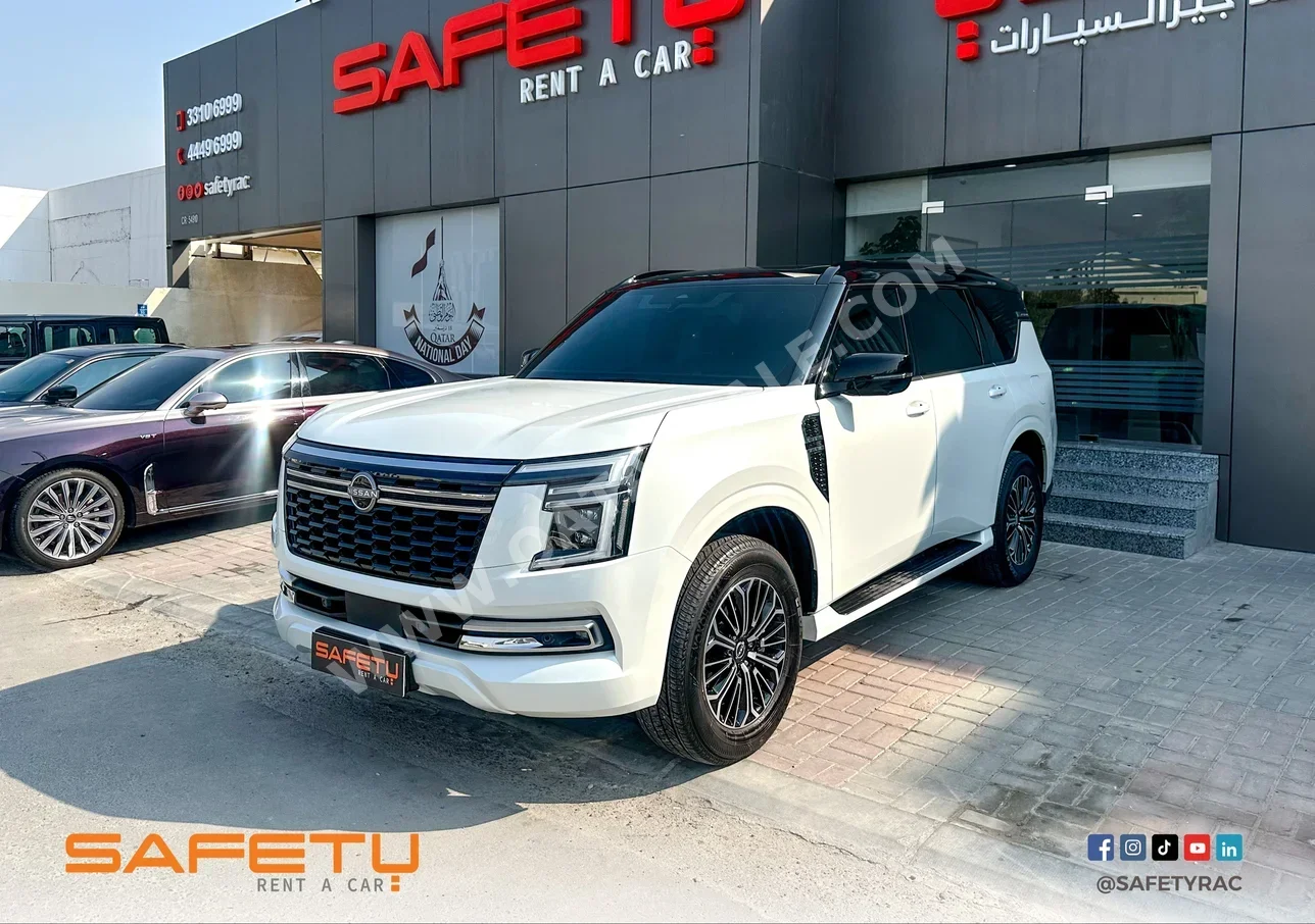 Nissan  Patrol  6 Cylinder  SUV ( AWD )  White  2025