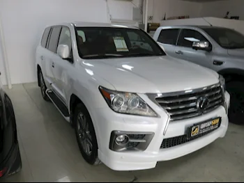 Lexus  LX  570 S  2015  Automatic  74,000 Km  8 Cylinder  Four Wheel Drive (4WD)  SUV  White