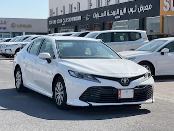 Toyota  Camry  LE  2019  Automatic  31,000 Km  4 Cylinder  Front Wheel Drive (FWD)  Sedan  White