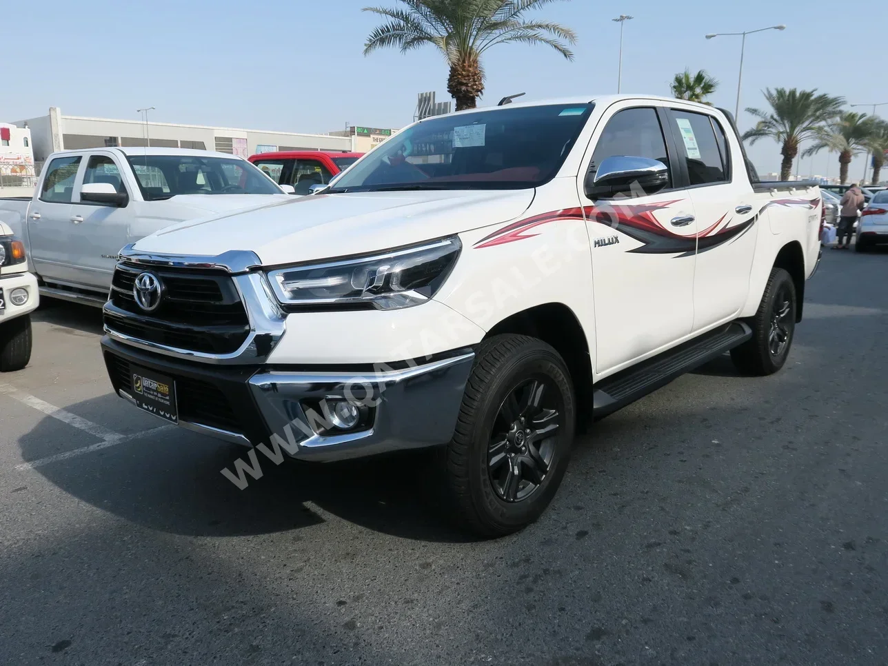 Toyota  Hilux  SR5  2023  Automatic  40,000 Km  4 Cylinder  Four Wheel Drive (4WD)  Pick Up  White  With Warranty