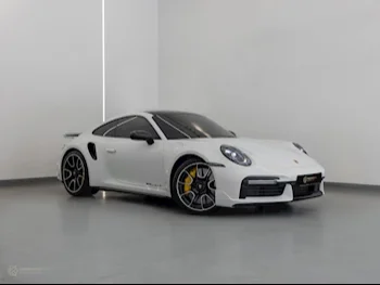 Porsche  911  Turbo S  2021  Automatic  13,950 Km  6 Cylinder  Rear Wheel Drive (RWD)  Coupe / Sport  White  With Warranty